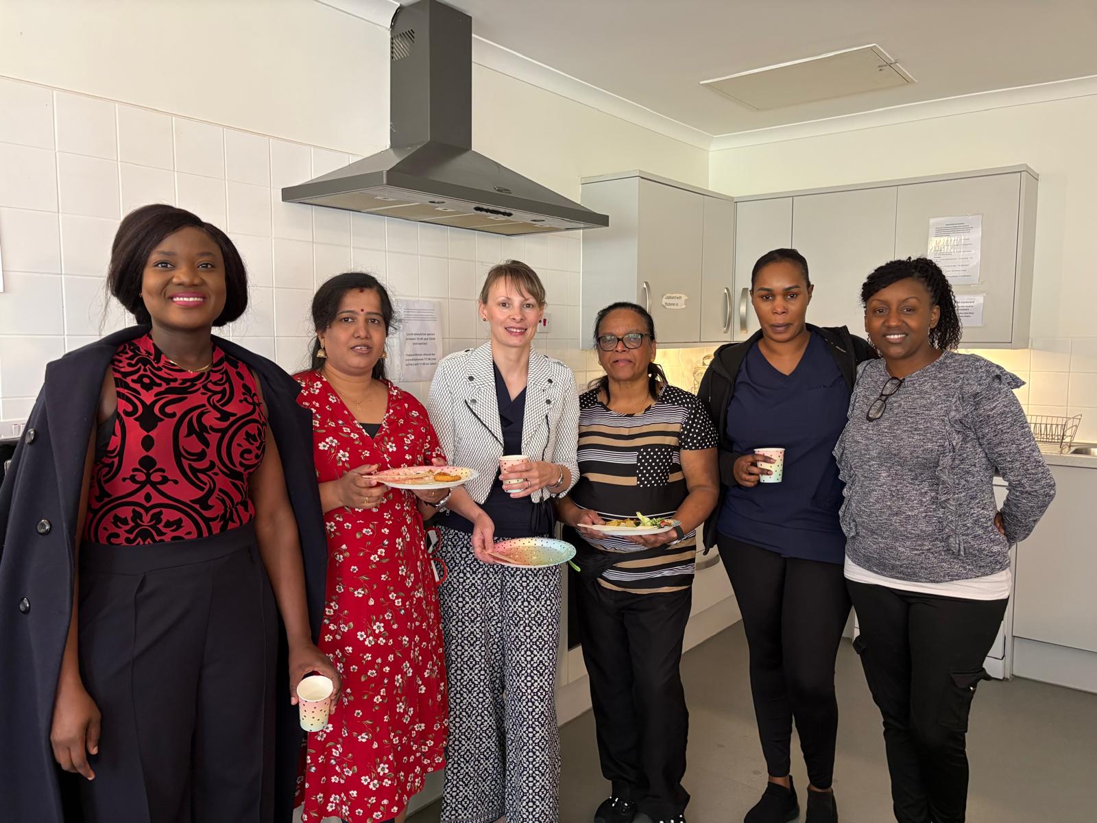 Female nurses standing together to celebrate International Nurses Day