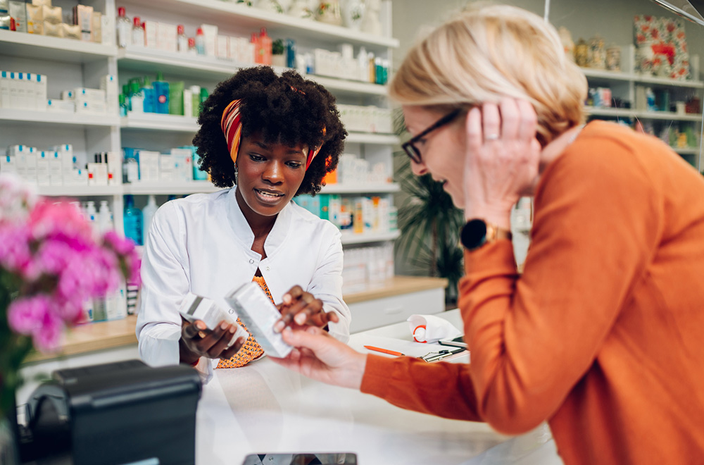 woman and her pharmacist