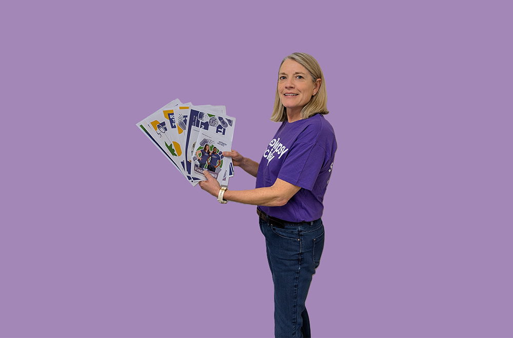 woman holding fundraising pack