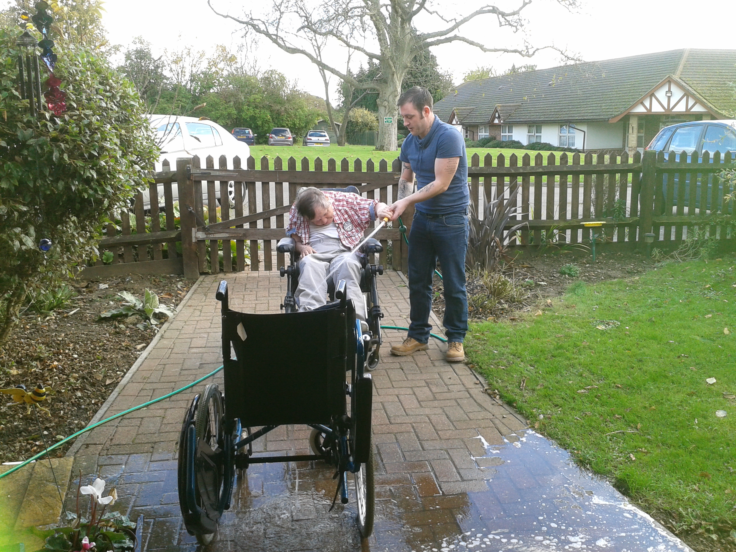 David using a garden hose