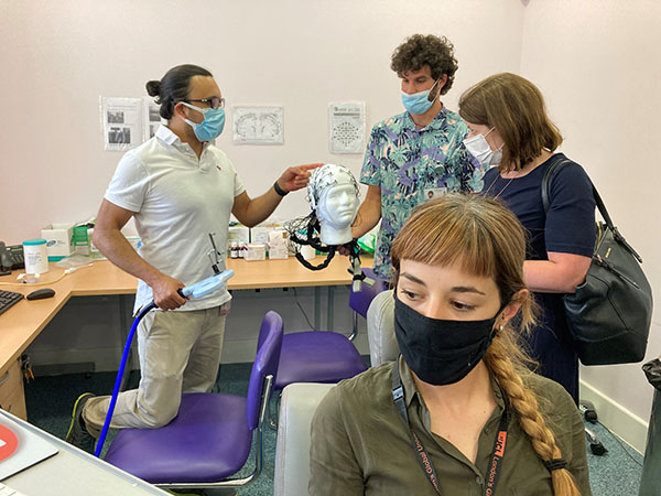 Members of our genomics team show how we use transcranial magnetic stimulation to see how genetic changes that cause epilepsy, affect the brain.