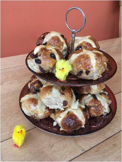 hot cross buns on a plate