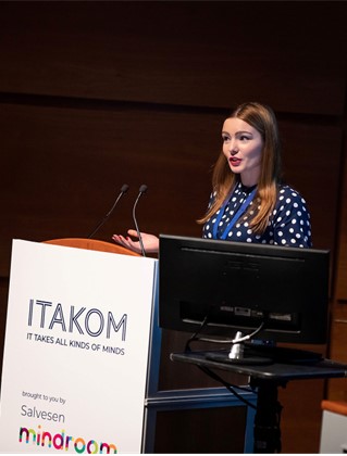 Holly Wagner speaking at the It Takes All Kinds Of Minds Conference 2023