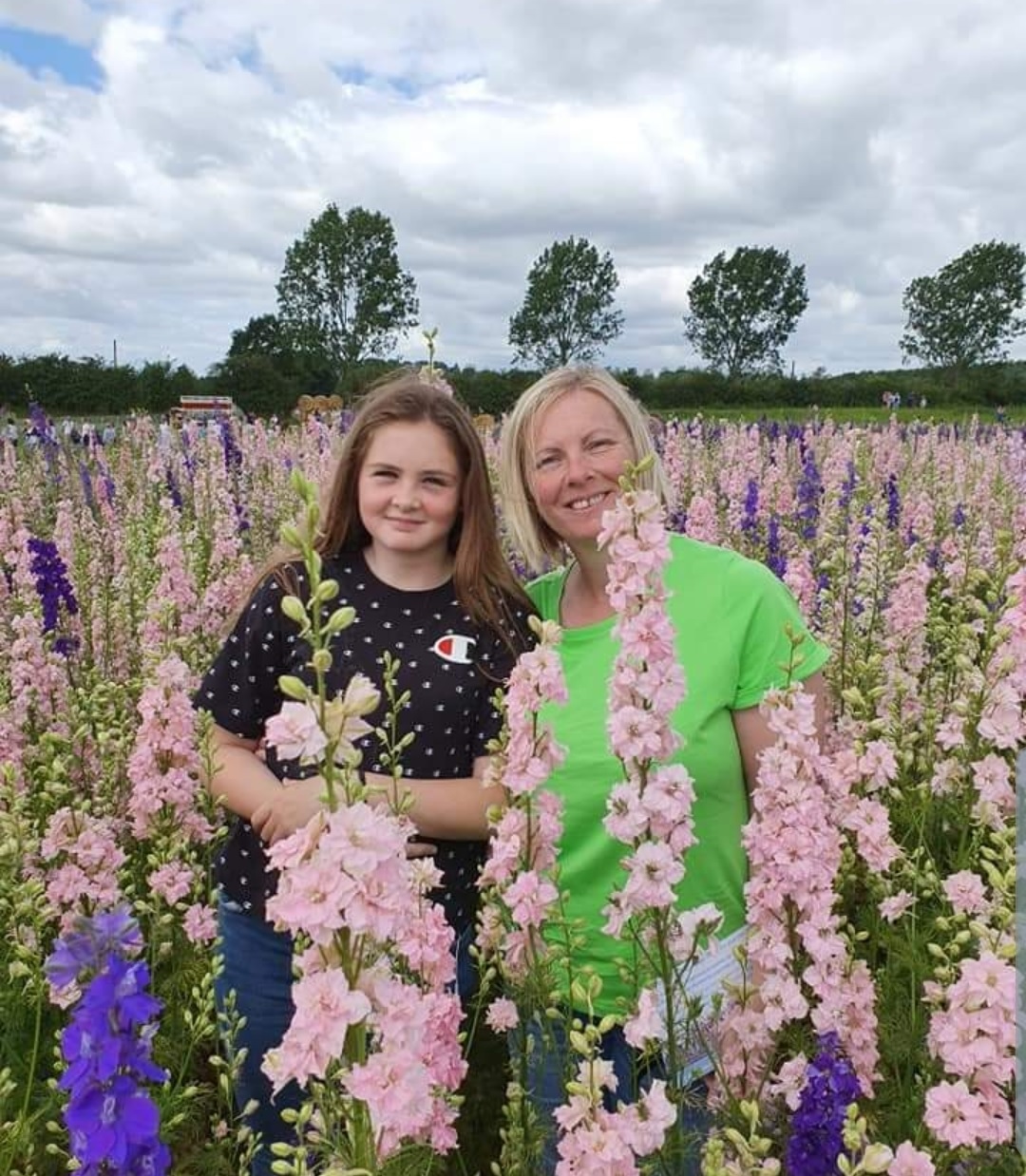 Woman and girl in a field of flowers