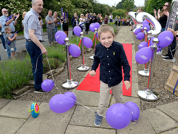 Zach Eagling in a moment of joy at the finishing line - All images Julian Hamilton, Daily Express