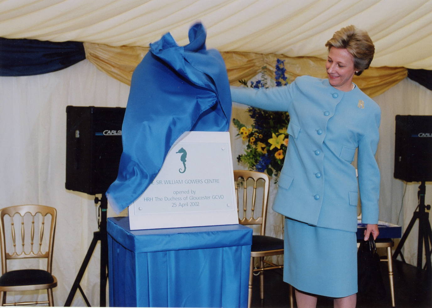 The Duchess of Gloucester unveils a commemorative plaque.
