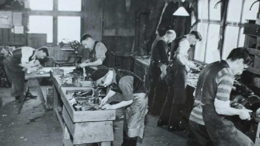 A group of men doing carpentry