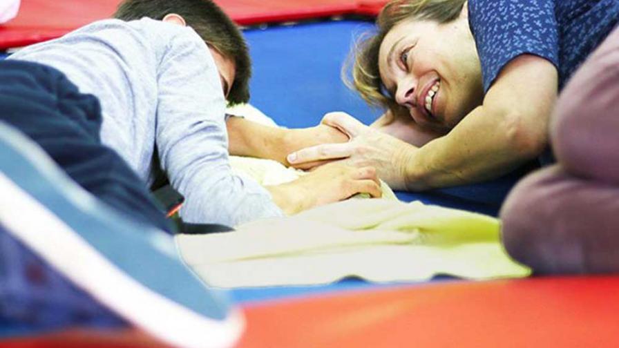 One of our therapists looking doing rebound therapy with a resident