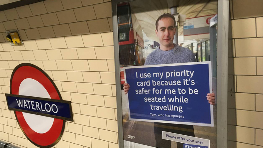 Tom campaigning on the tube