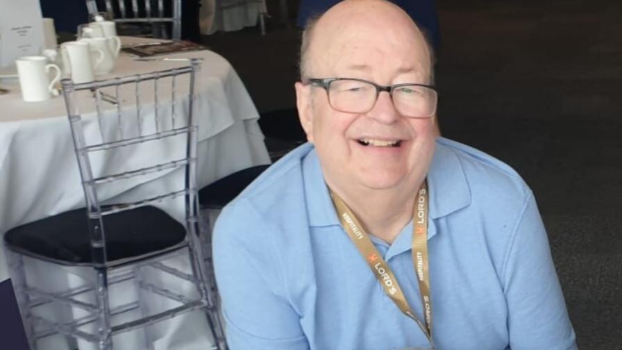 Ken smiling at camera