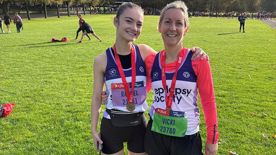 two women with medals