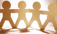 paper dolls holding hands