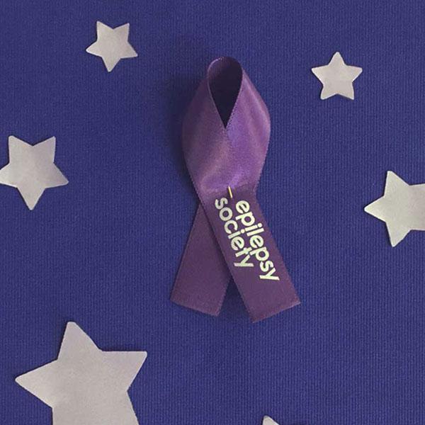 purple fabric ribbon pin