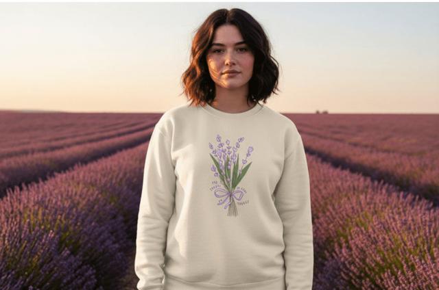 woman in lavender field in branded jumper
